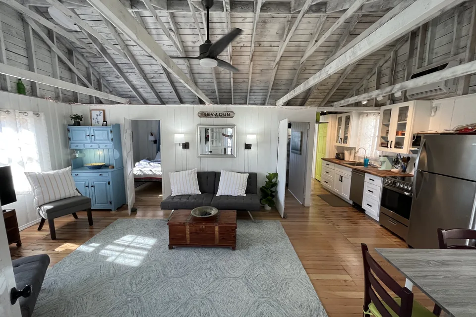 The cottage's living room and front door after the remodel.