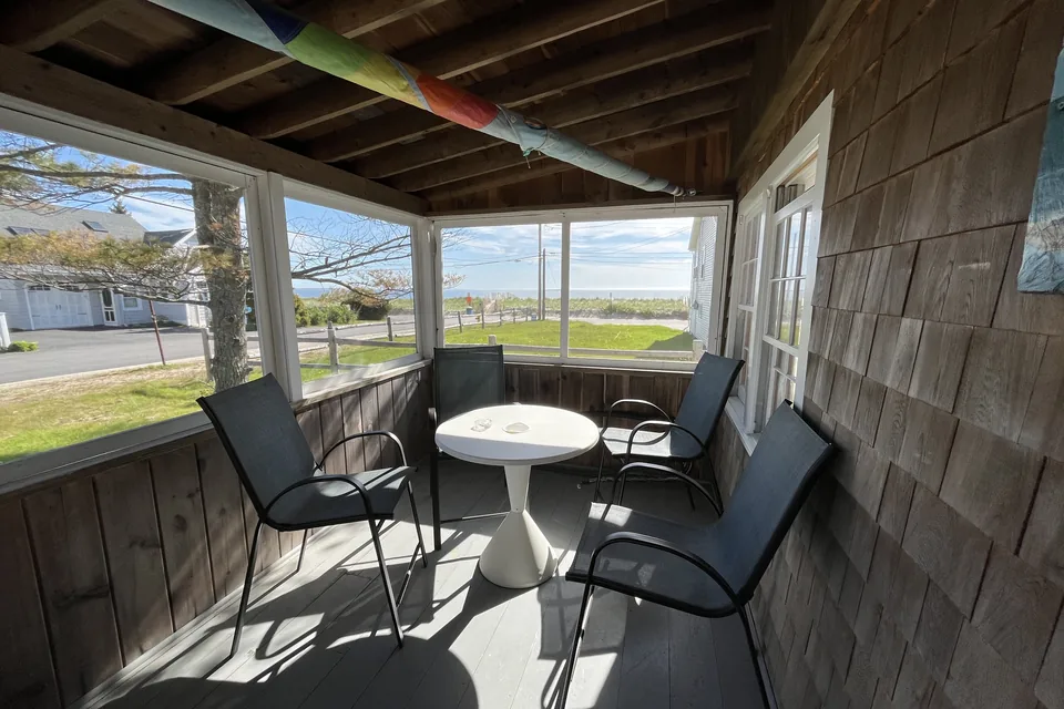 The cottage's porch in Saco.